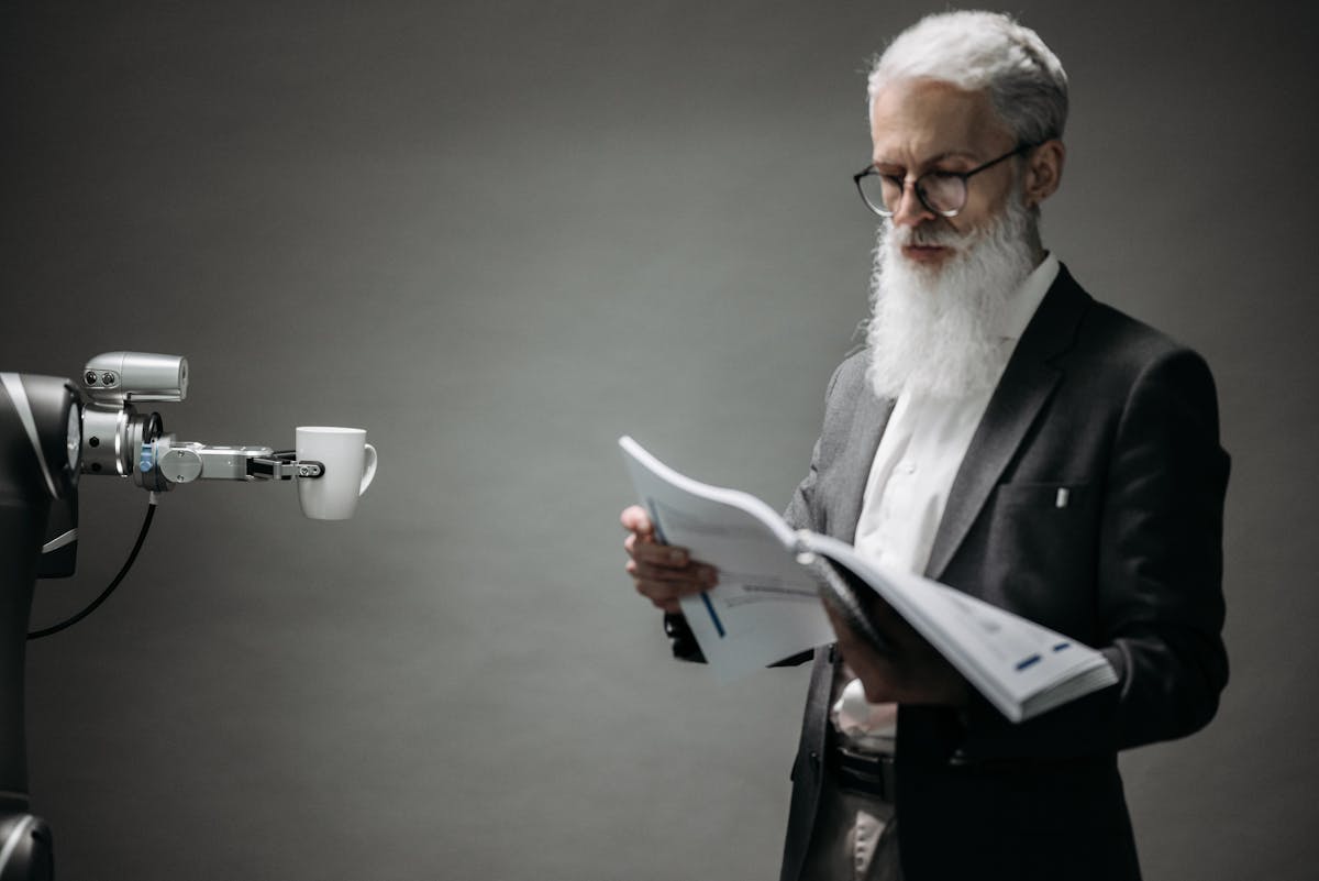 Small robot on a desk representing practical AI automation