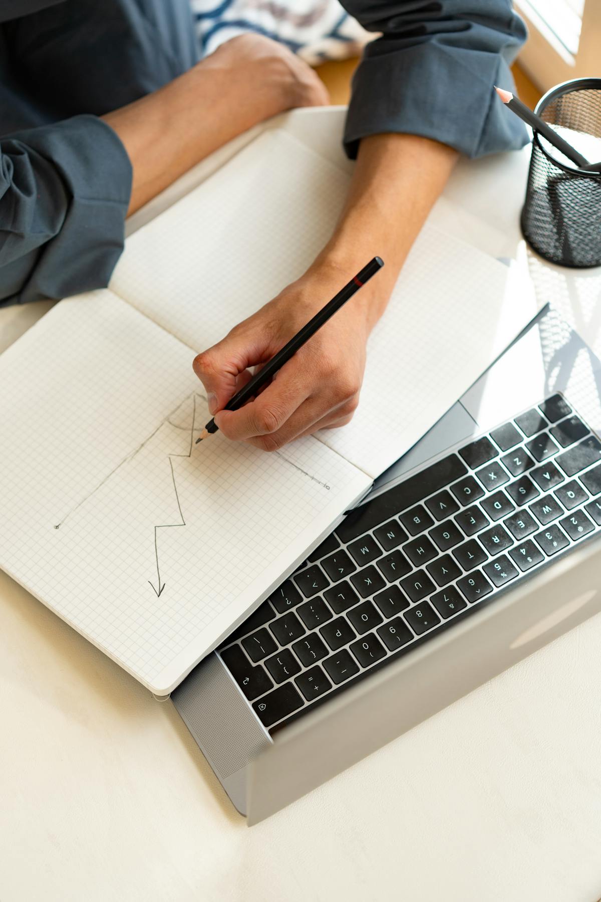 Notebook and laptop used for planning controlled AI process design