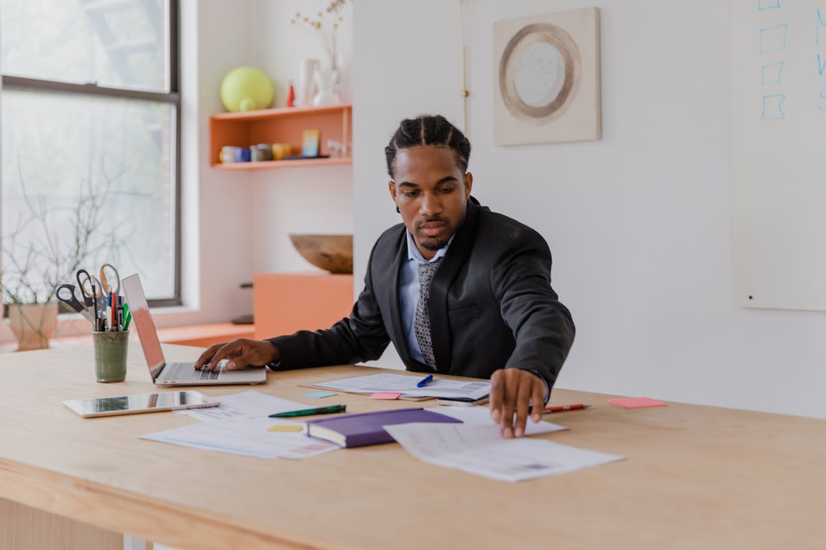 Insurance paperwork and office tools on a desk