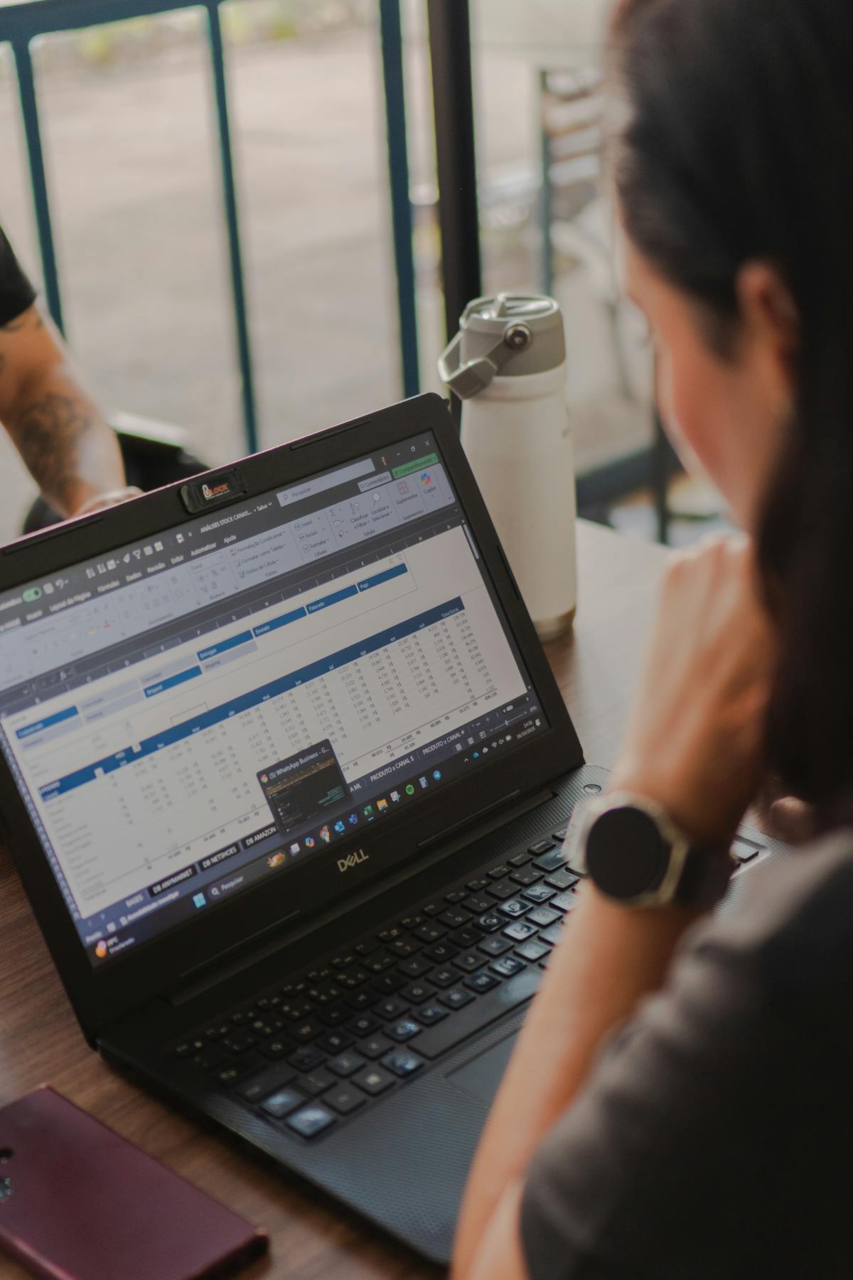 Spreadsheet open on a laptop during a business workflow review